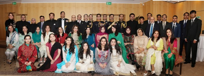 Officials and their families in a group photo with Syed Ibne Abbas, Pakistan High Commissioner to the UK at the Pakistan Day Reception in London on 23-3-201