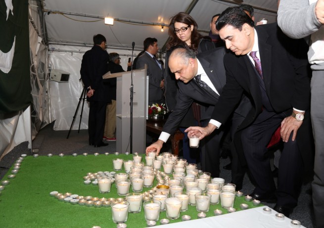 Photos taken at the Candle Light Vigil for Lahore terrorist attack victims at the Pakistan High Commission London on 29-3-2016