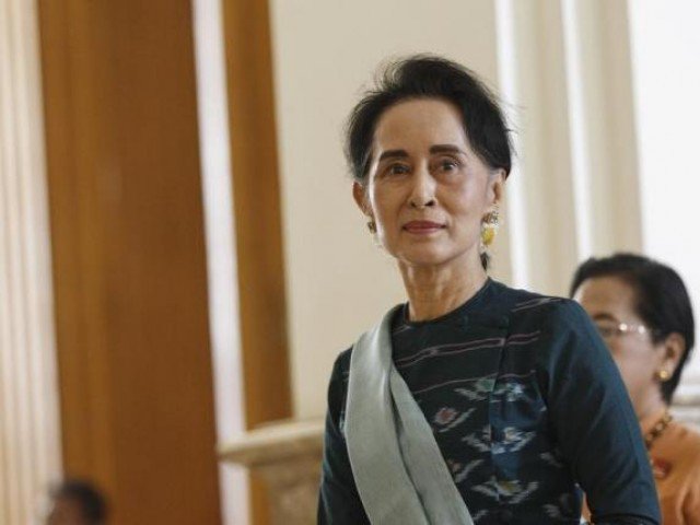 National League for Democracy (NLD) party leader Aung San Suu Kyi arrives at the Union Parliament in Naypyitaw, Myanmar March 15, 2016. PHOTO: REUTERS